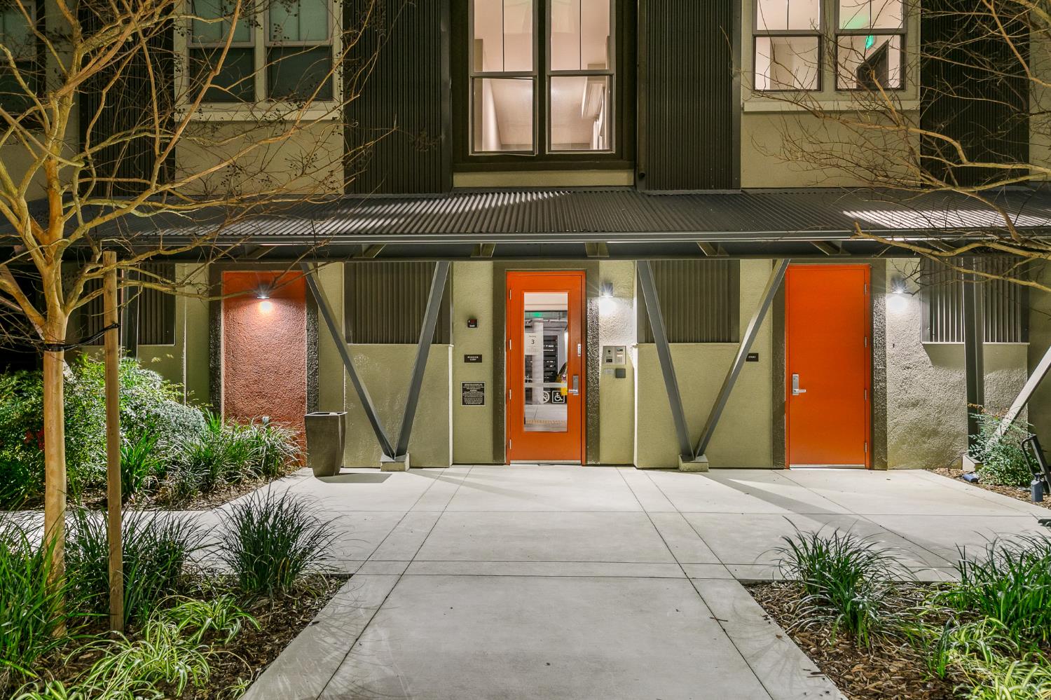1661 Spring Street, Unit 433 Davis, CA 95616 - Photo 6 of 56 a view of a brick house with large windows