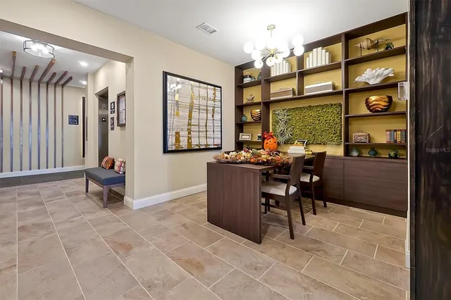 a view of livingroom with furniture and windows