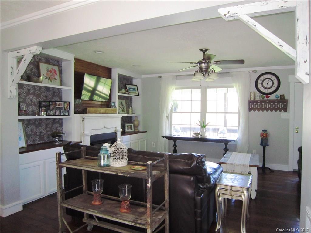 266 Murray Road Canton, NC 28716 - Photo 3 of 36 a view of a dining room with furniture window and wooden floor