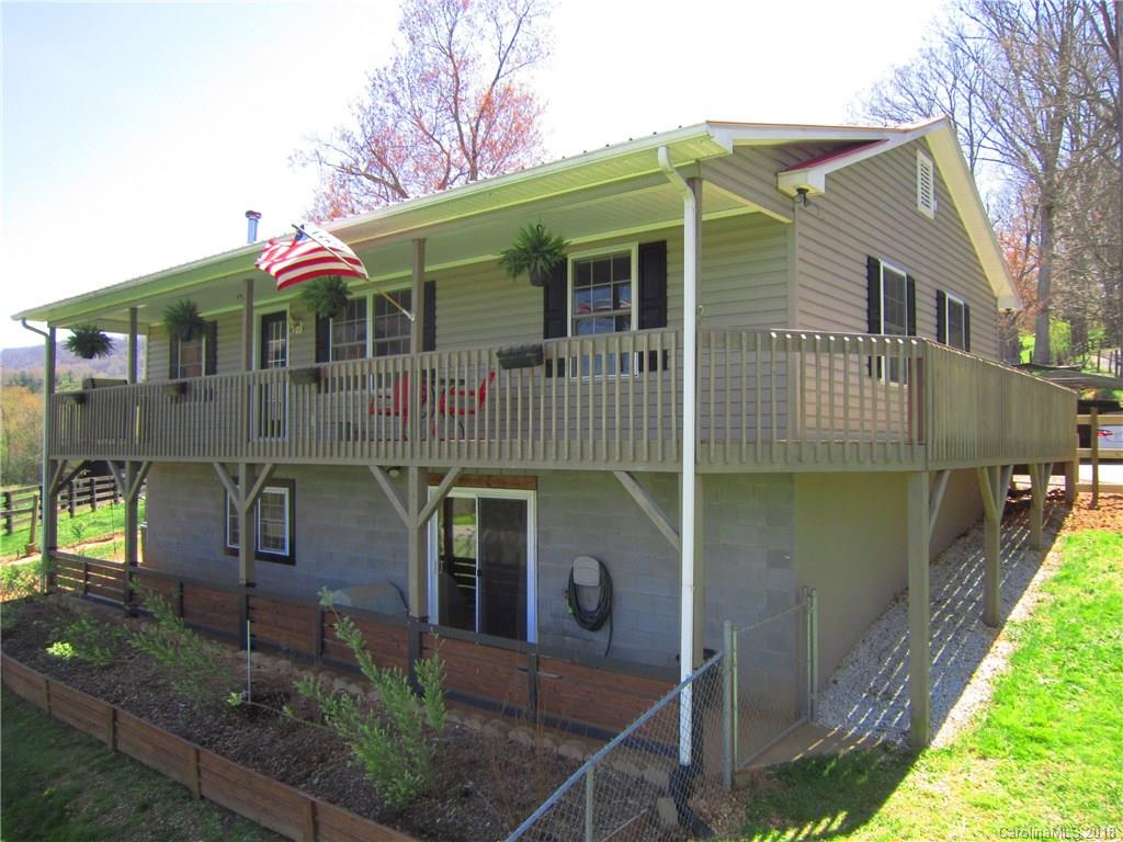 266 Murray Road Canton, NC 28716 - Photo 23 of 36 a front view of a house with garden