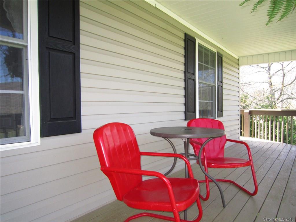 266 Murray Road Canton, NC 28716 - Photo 24 of 36 a view of a chairs in patio