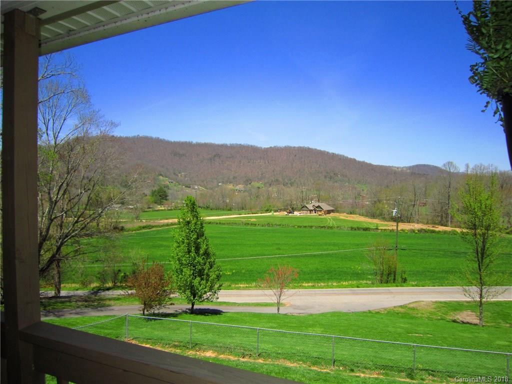 266 Murray Road Canton, NC 28716 - Photo 27 of 36 a view of a yard with a mountain view