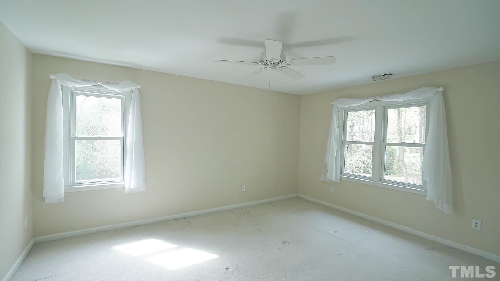 10721 Durant Road Raleigh, NC 27615 - Photo 26 of 37 an empty room with a window