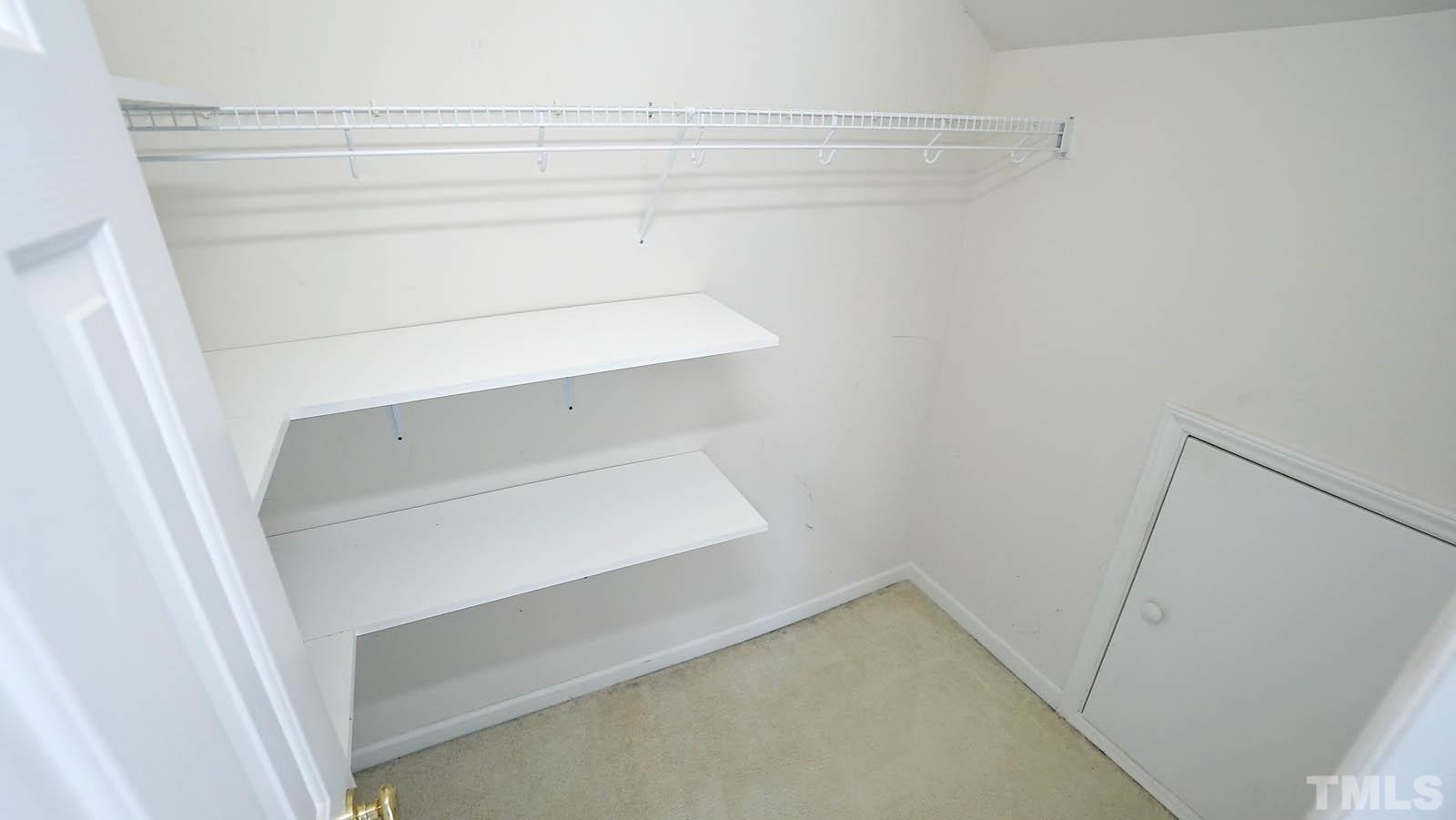 10721 Durant Road Raleigh, NC 27615 - Photo 28 of 37 a view of an empty walk in closet