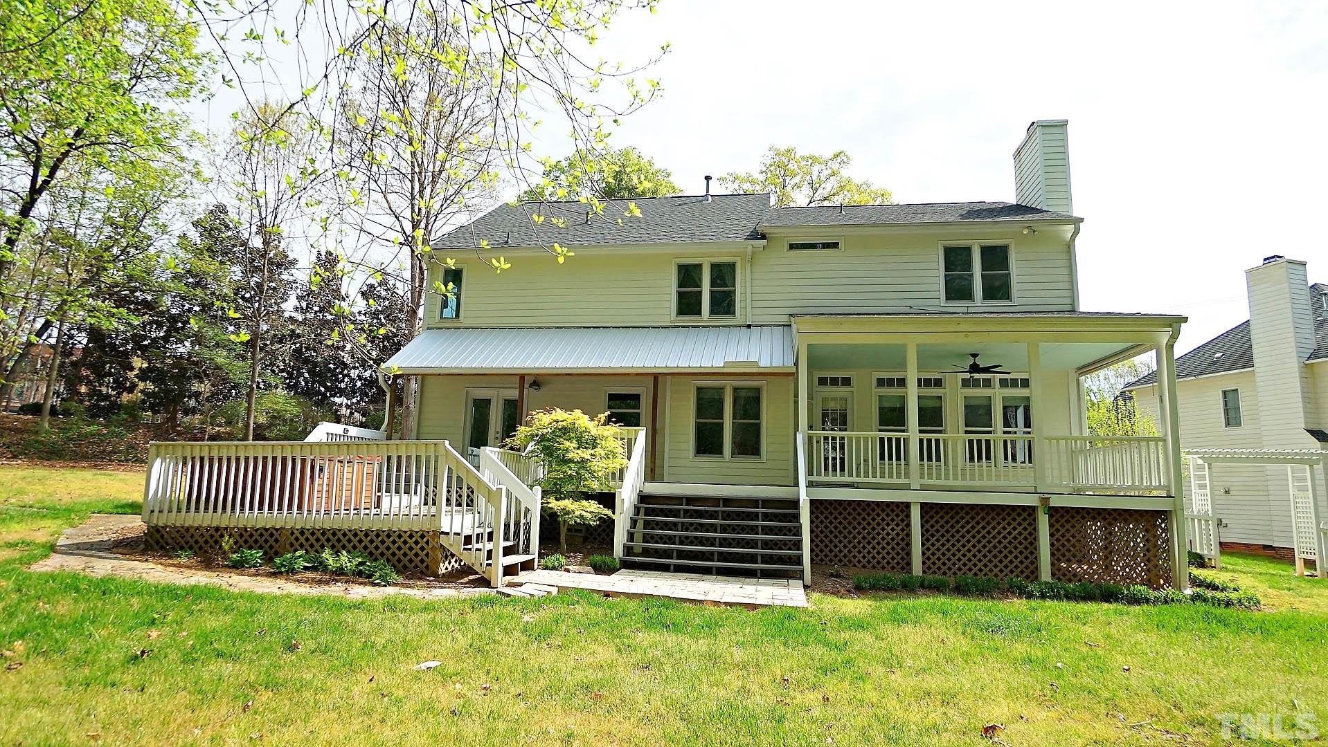 10721 Durant Road Raleigh, NC 27615 - Photo 29 of 37 a front view of a house with a yard