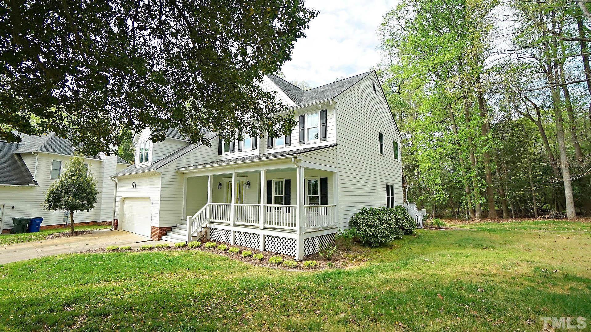 10721 Durant Road Raleigh, NC 27615 - Photo 3 of 37 front view of a house with a yard