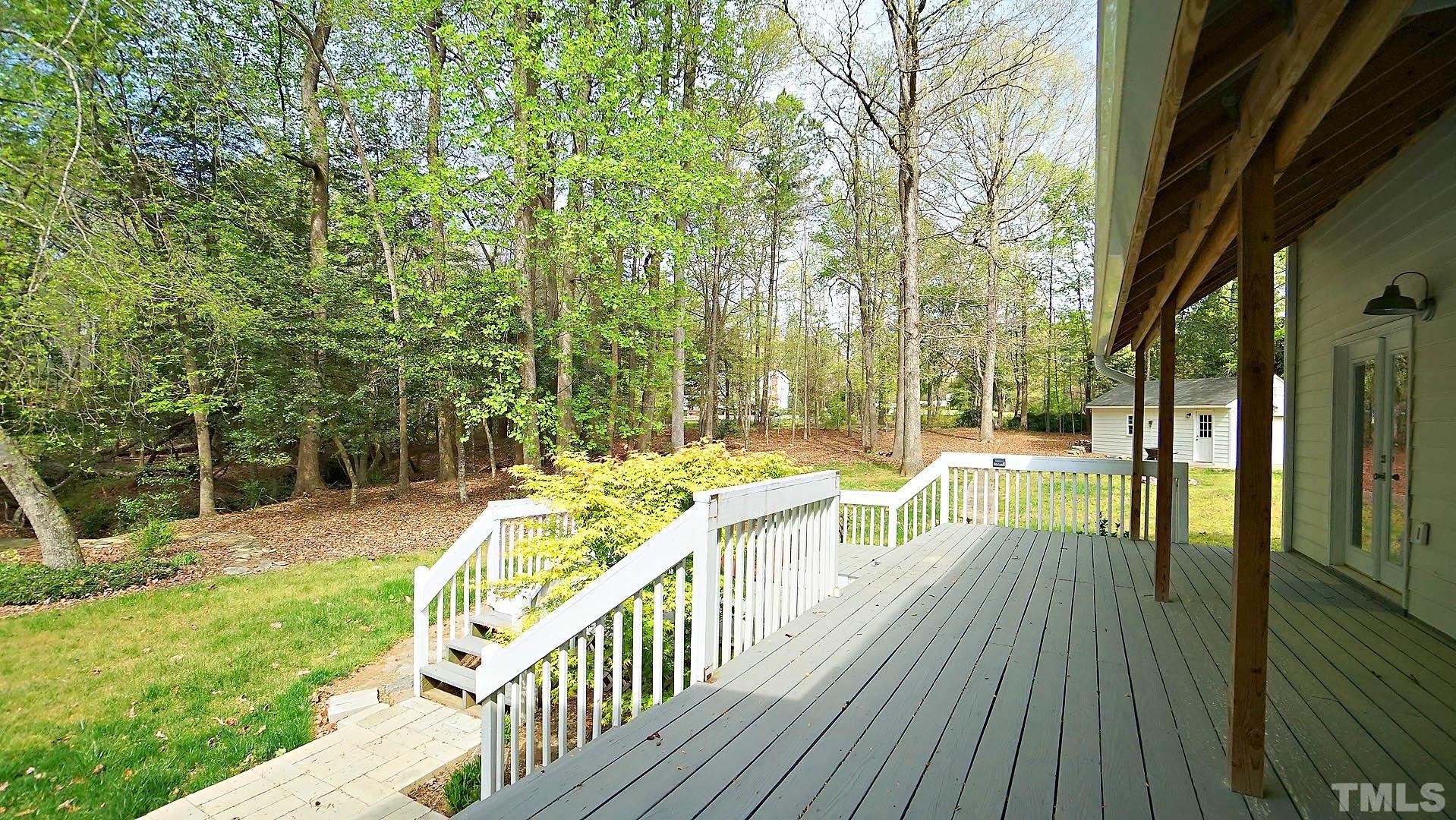 10721 Durant Road Raleigh, NC 27615 - Photo 33 of 37 a view of a balcony with yard