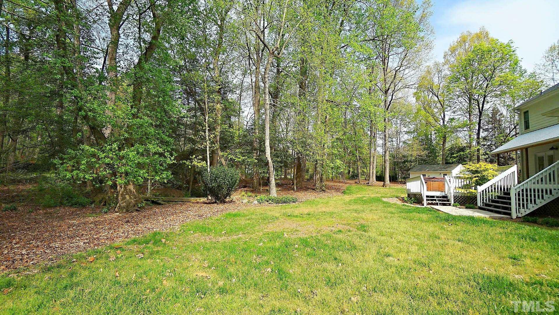 10721 Durant Road Raleigh, NC 27615 - Photo 35 of 37 a view of a park with large trees
