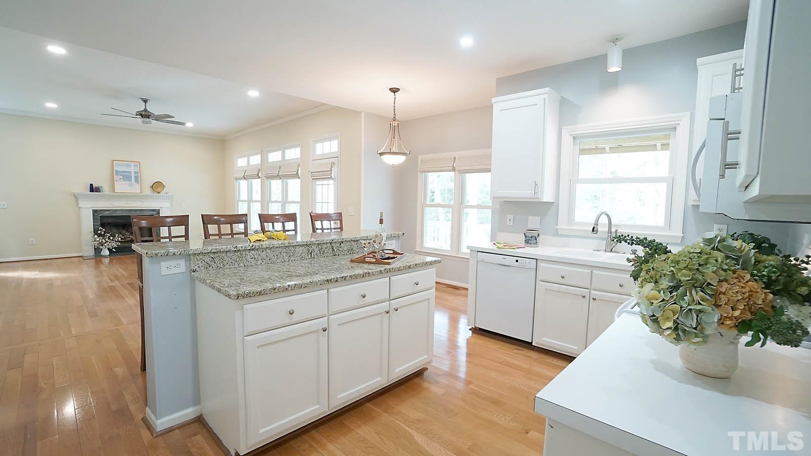 10721 Durant Road Raleigh, NC 27615 - Photo 8 of 37 a kitchen with sink and cabinets