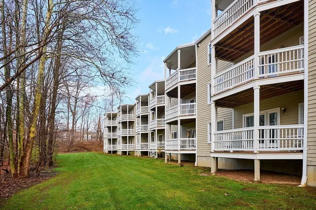 a building with trees in front of it