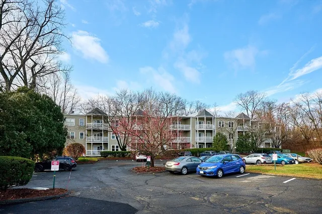 a cars parked in front of a building