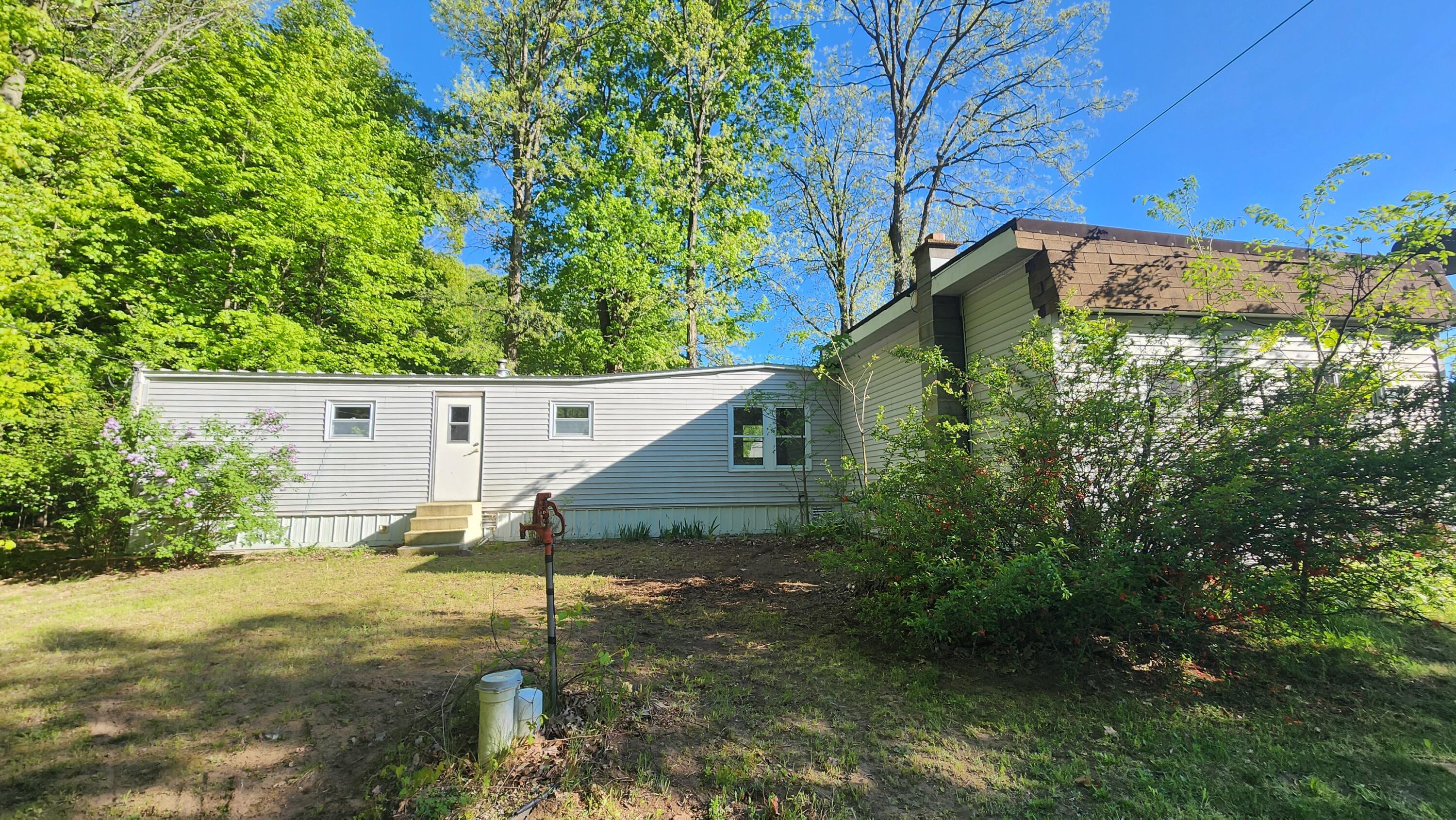 14915 White Road Bailey, MI 49303 - Photo 3 of 37 Side