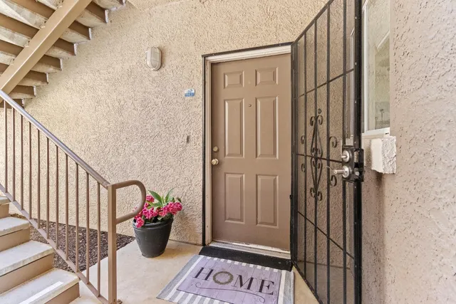 a view of a kitchen with wooden floor