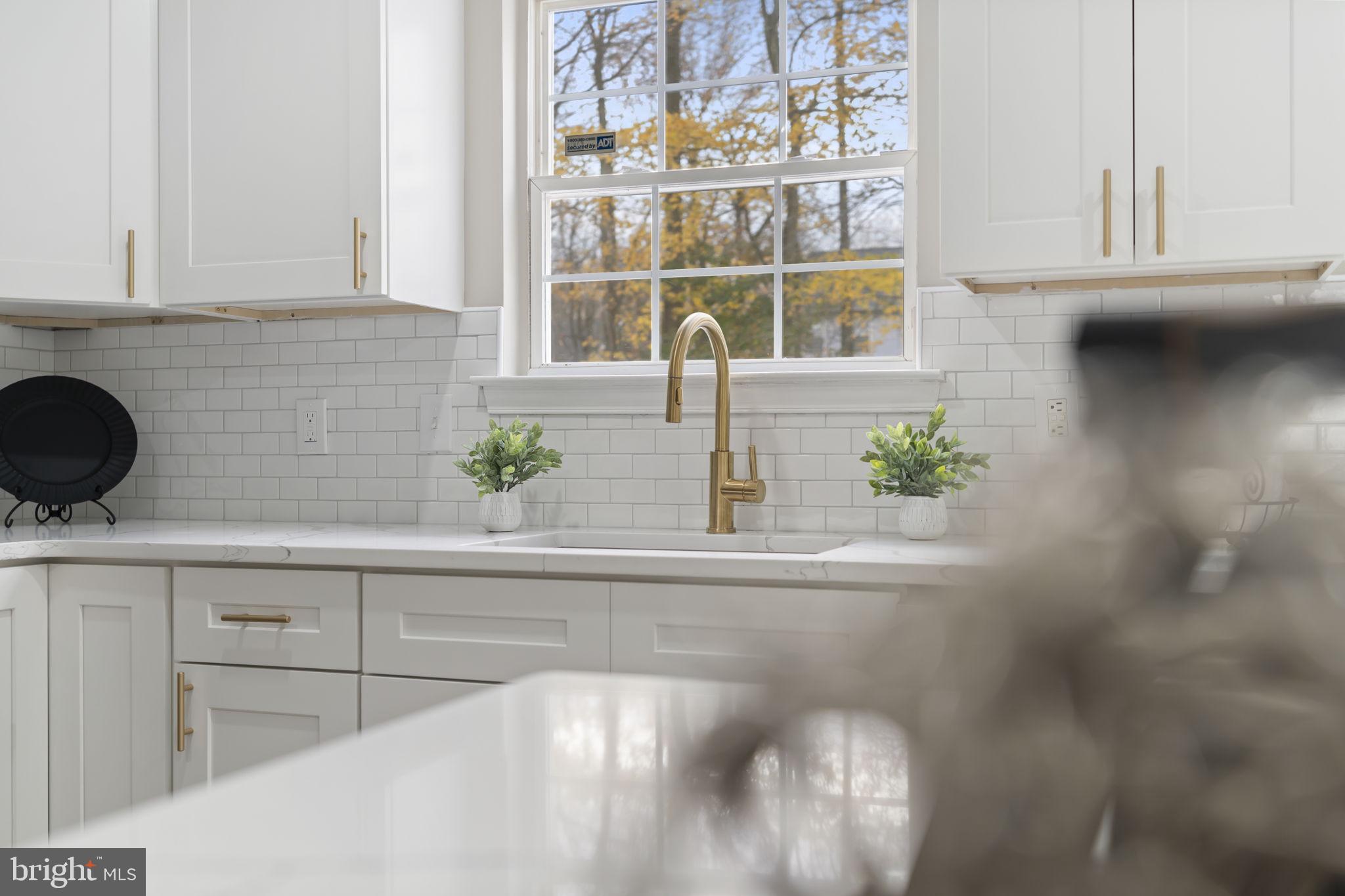 20 Elks Trail New Castle, DE 19720 - Photo 16 of 40 a bathroom with a sink and a window