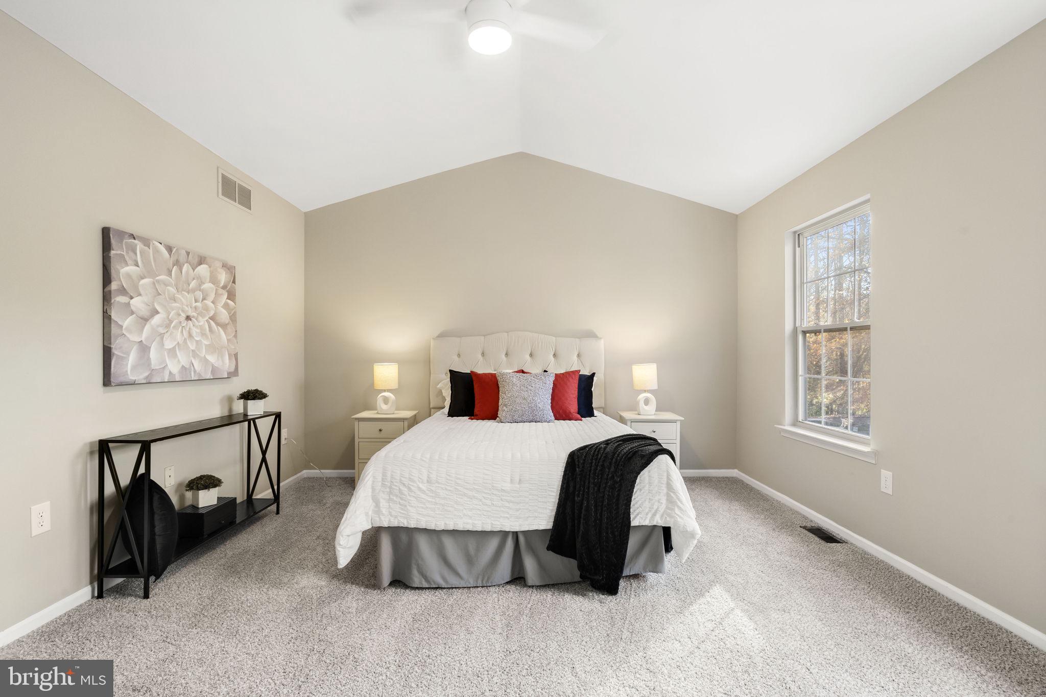 20 Elks Trail New Castle, DE 19720 - Photo 24 of 40 a bedroom with a bed and wooden floor