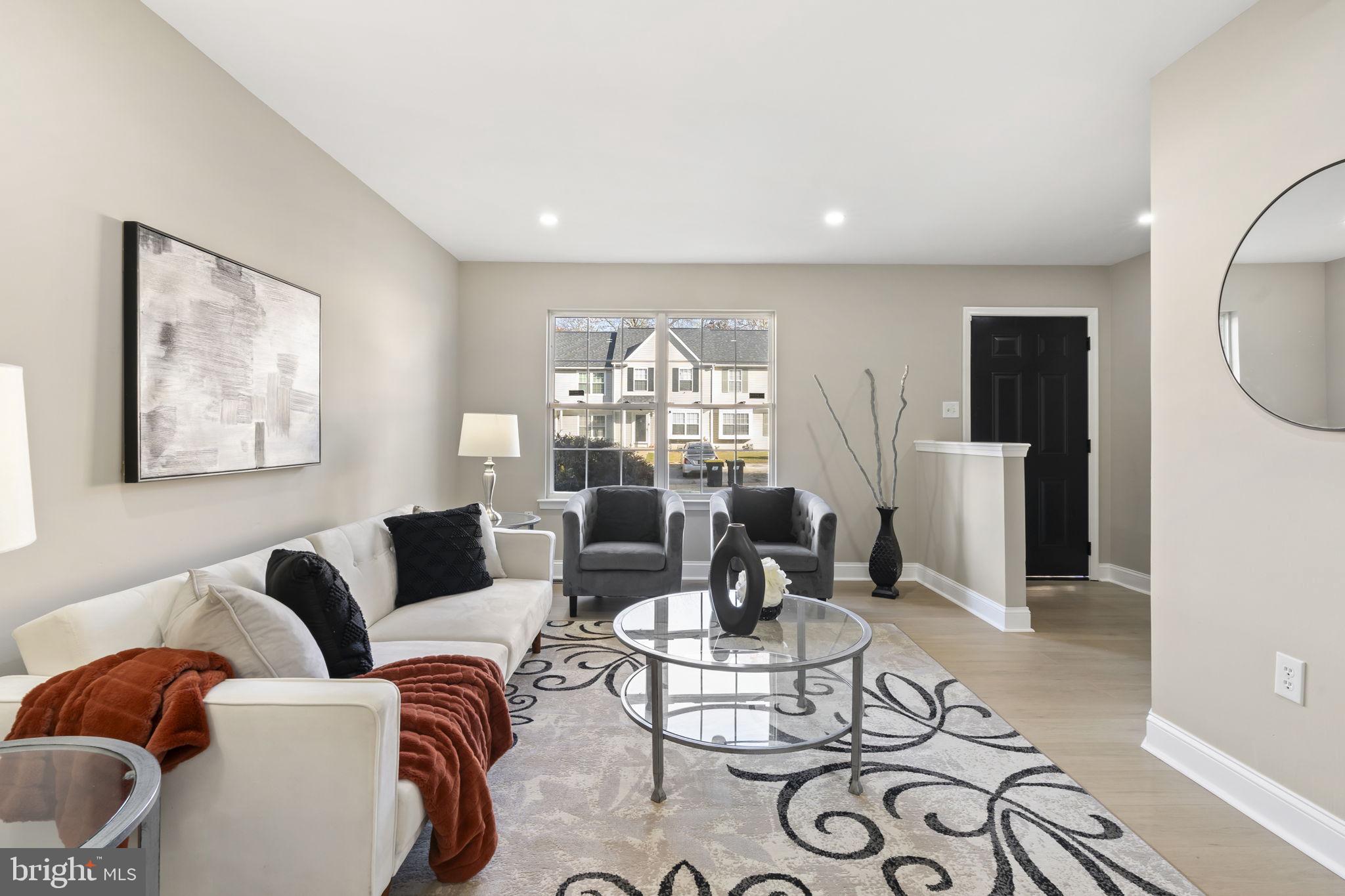20 Elks Trail New Castle, DE 19720 - Photo 6 of 40 a living room with furniture and wooden floor