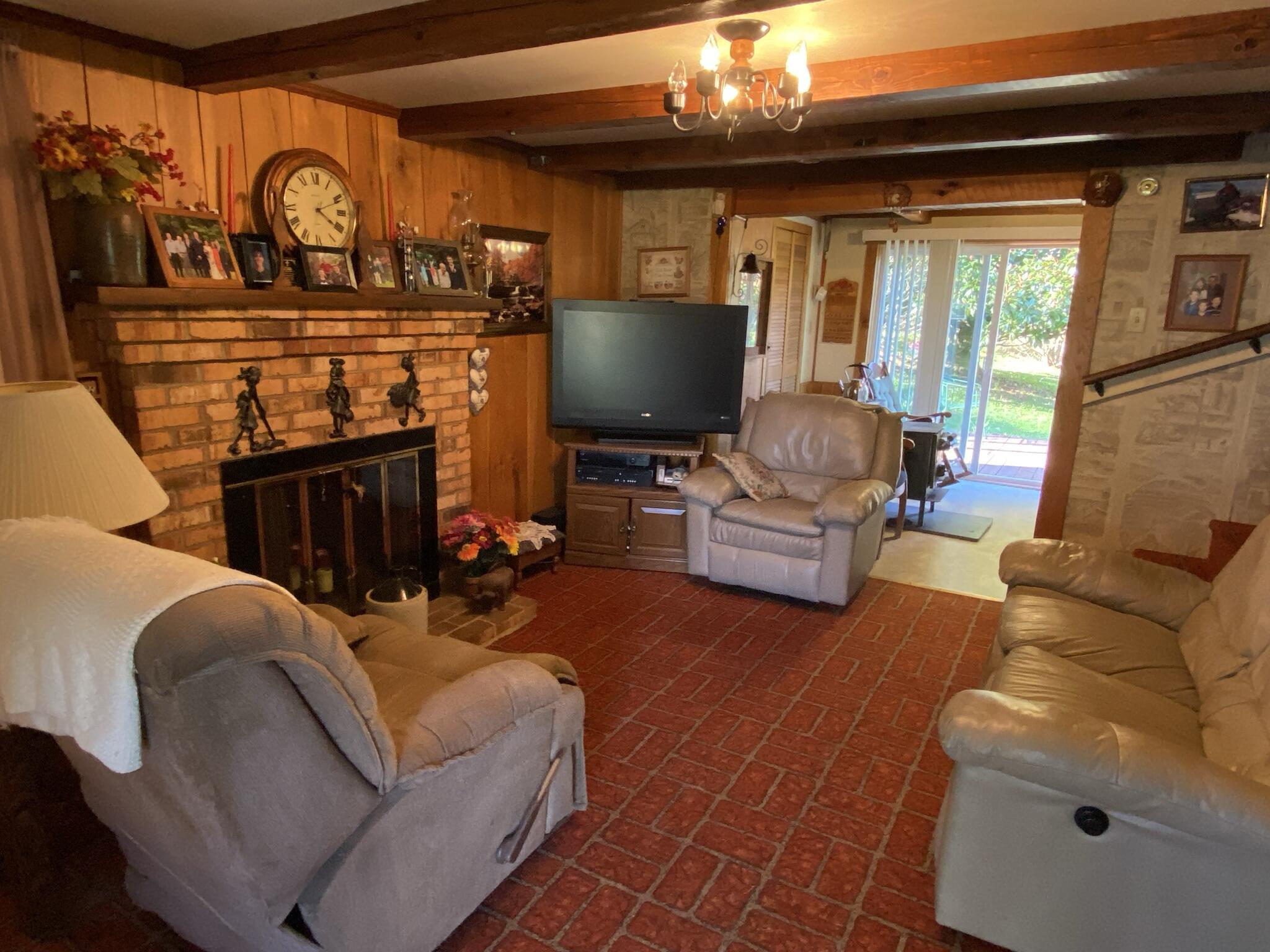 759 Runnett Bag Road Ferrum, VA 24088 - Photo 39 of 74 a living room with furniture and a fireplace