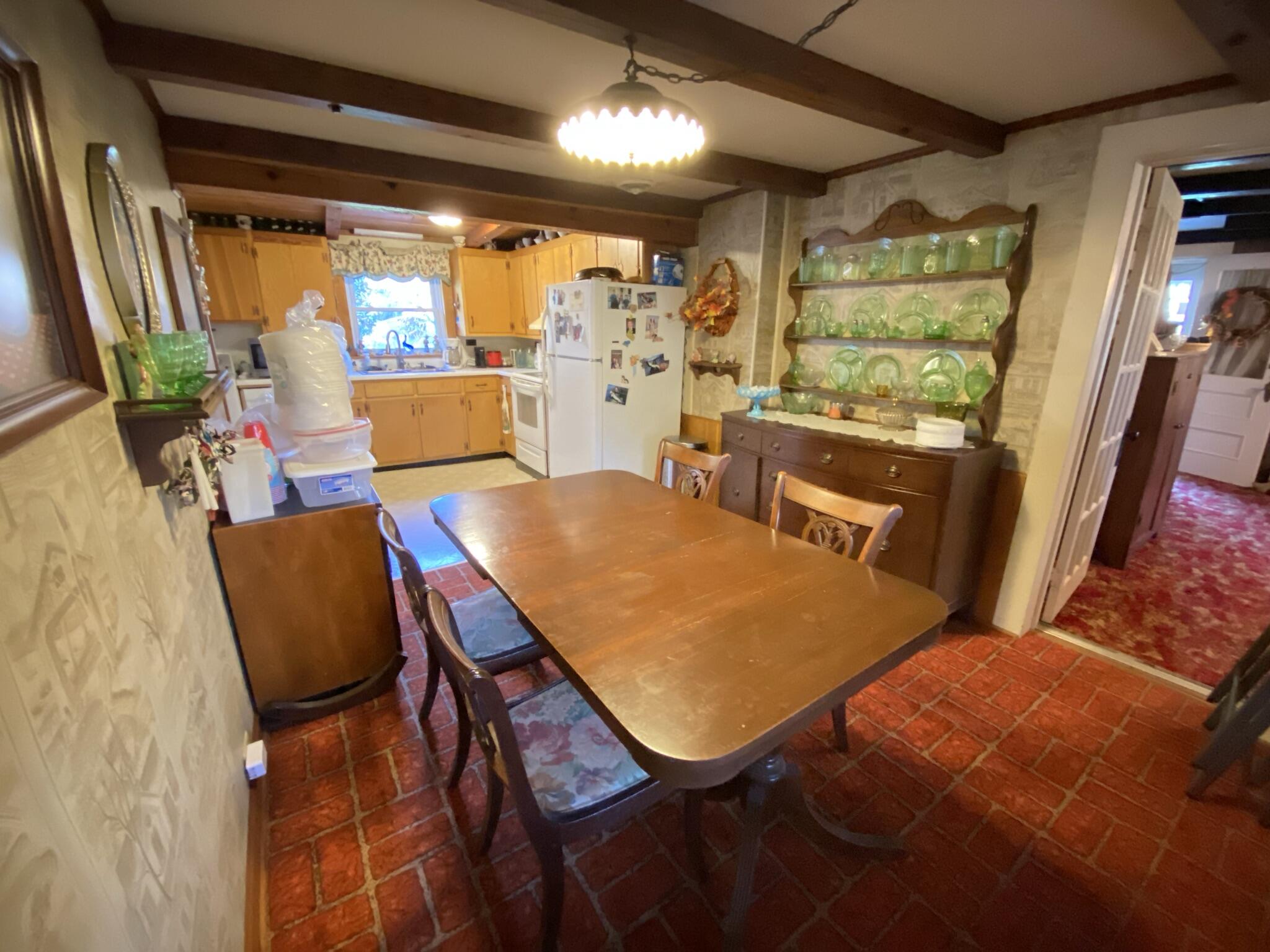 759 Runnett Bag Road Ferrum, VA 24088 - Photo 46 of 74 a view of a dining room with furniture window and outside view