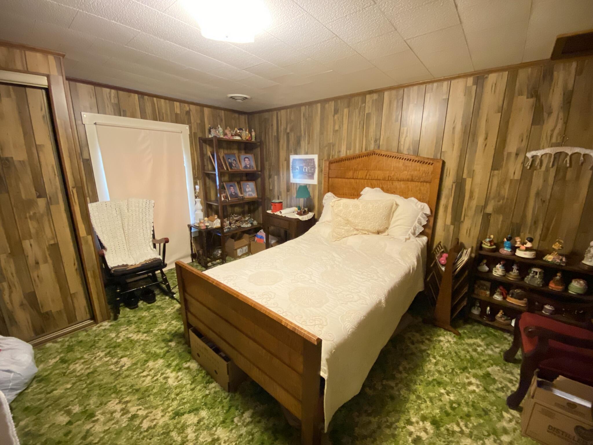 759 Runnett Bag Road Ferrum, VA 24088 - Photo 48 of 74 a spacious bedroom with a bed and a dresser