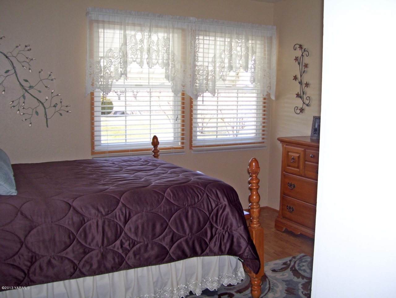 1401 Franklin Road Tieton, WA 98947 - Photo 13 of 20 a bed sitting in a bedroom next to a window
