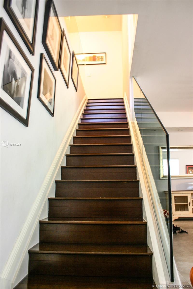 3067 Indiana Street, Unit 17 Miami, FL 33133 - Photo 15 of 33 Staircase to upper level