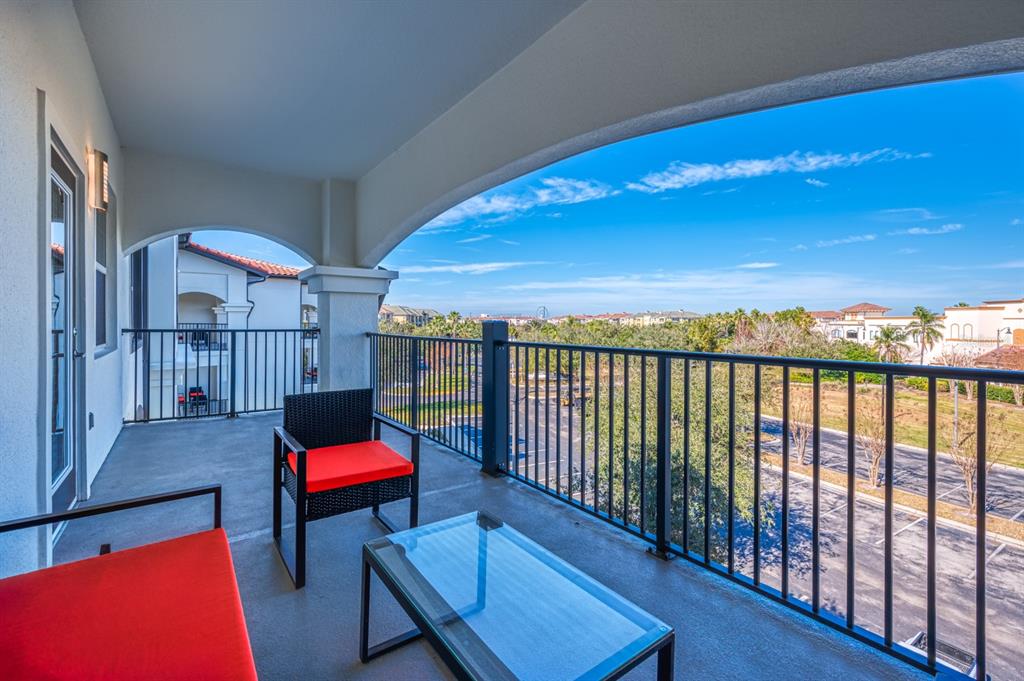 4013 Breakview Drive, Unit A407 Orlando, FL 32819 - Photo 13 of 32 a view of a chairs and tables in the balcony