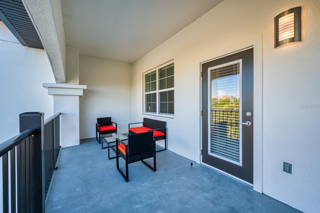 4013 Breakview Drive, Unit A407 Orlando, FL 32819 - Photo 14 of 32 a view of a workspace with furniture and a window
