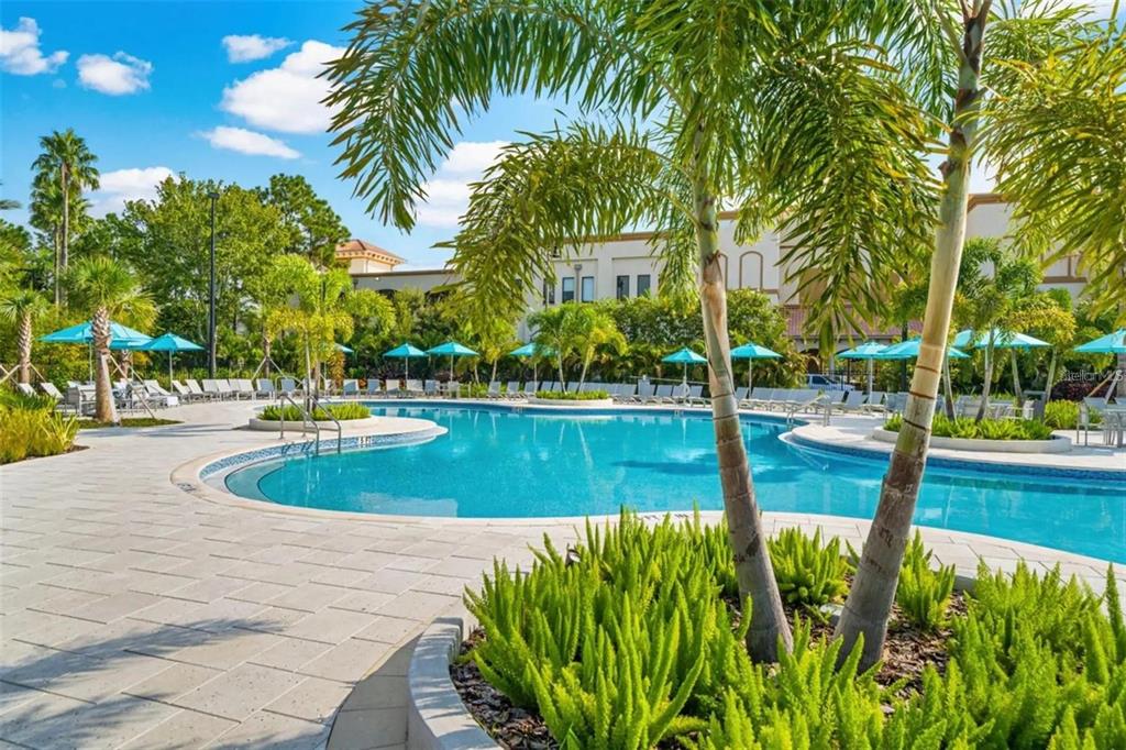 4013 Breakview Drive, Unit A407 Orlando, FL 32819 - Photo 30 of 32 a view of a swimming pool with a patio