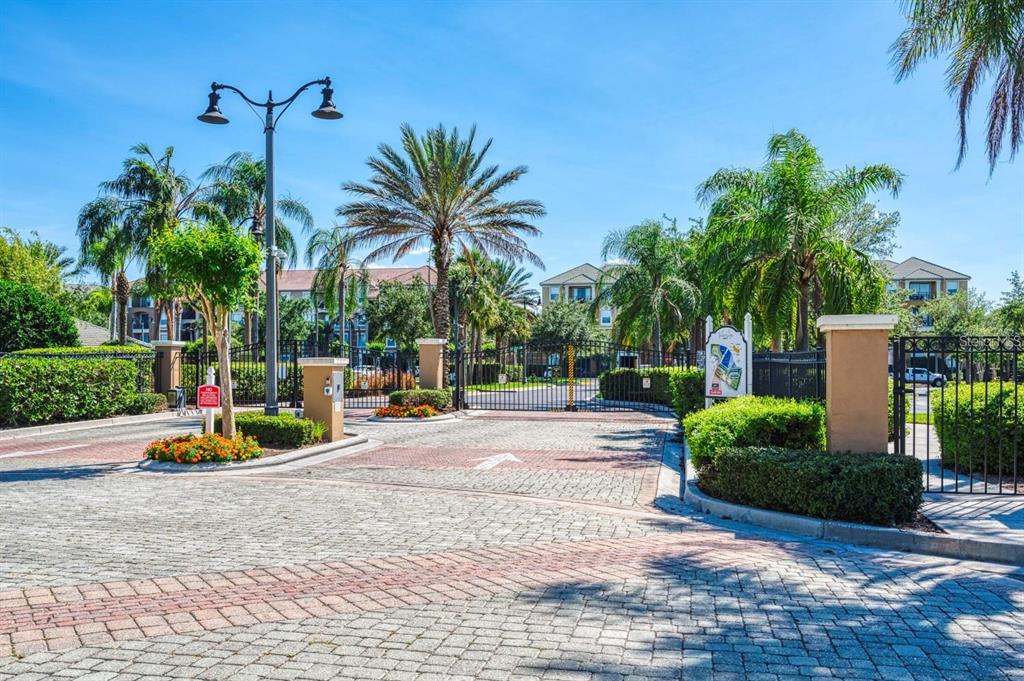 4013 Breakview Drive, Unit A407 Orlando, FL 32819 - Photo 31 of 32 a view of bike park with palm trees