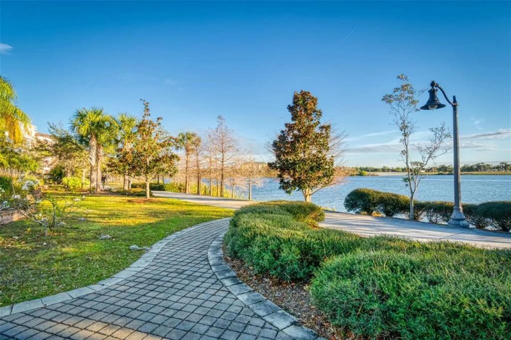 4013 Breakview Drive, Unit A407 Orlando, FL 32819 - Photo 32 of 32 a view of a park with large trees