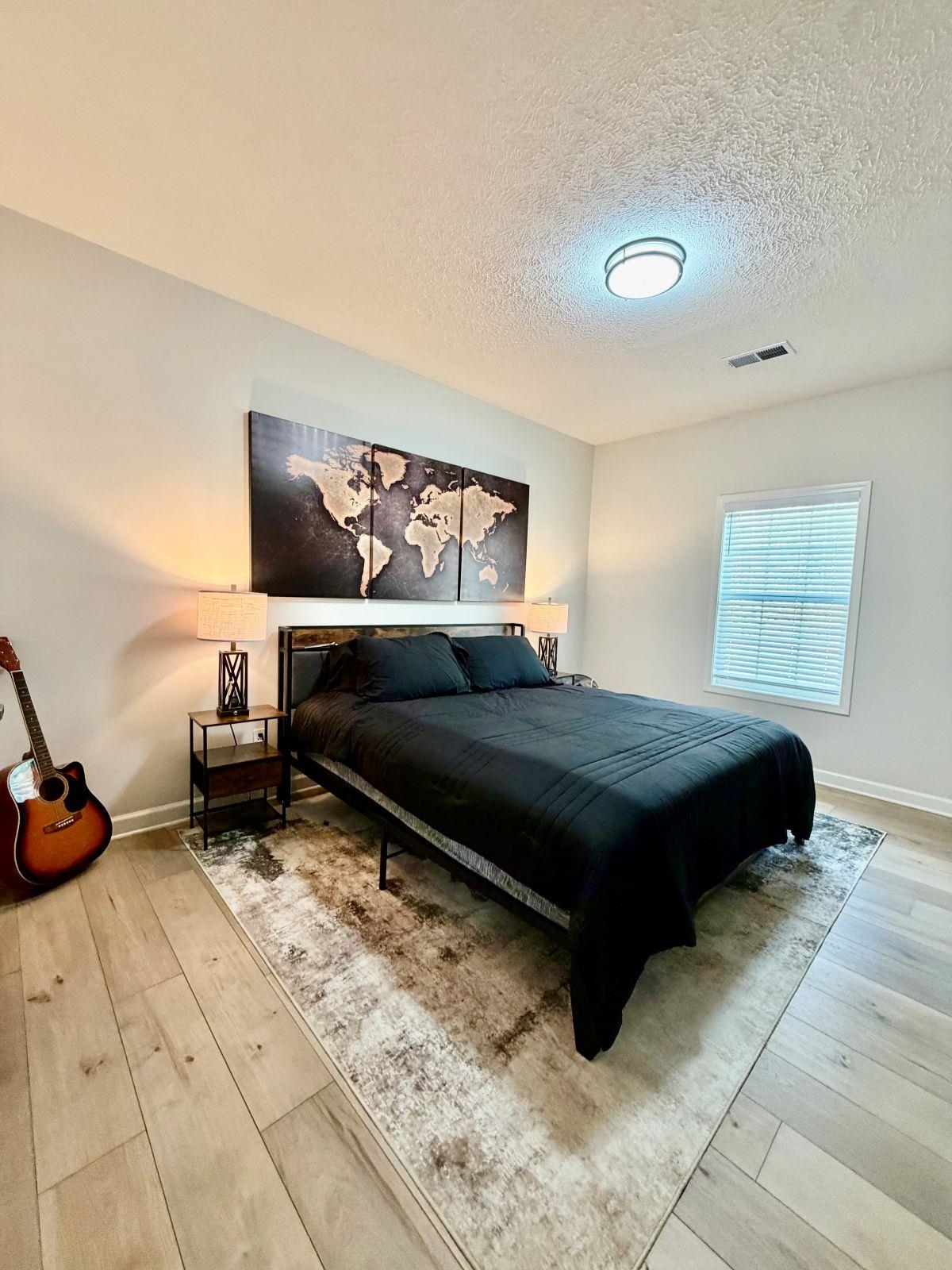 725 Crow Lane Counce, TN 38326 - Photo 11 of 19 a bedroom with a bed and a window
