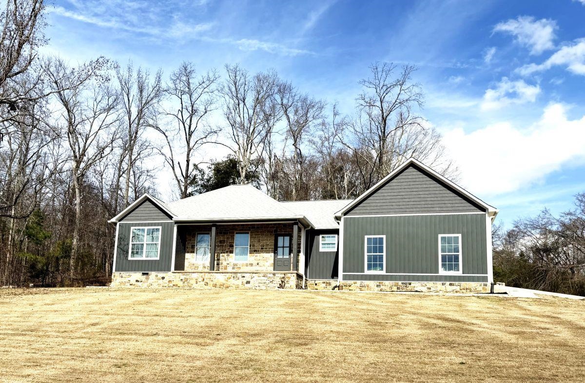 725 Crow Lane Counce, TN 38326 - Photo 15 of 19 a front view of a house with a yard