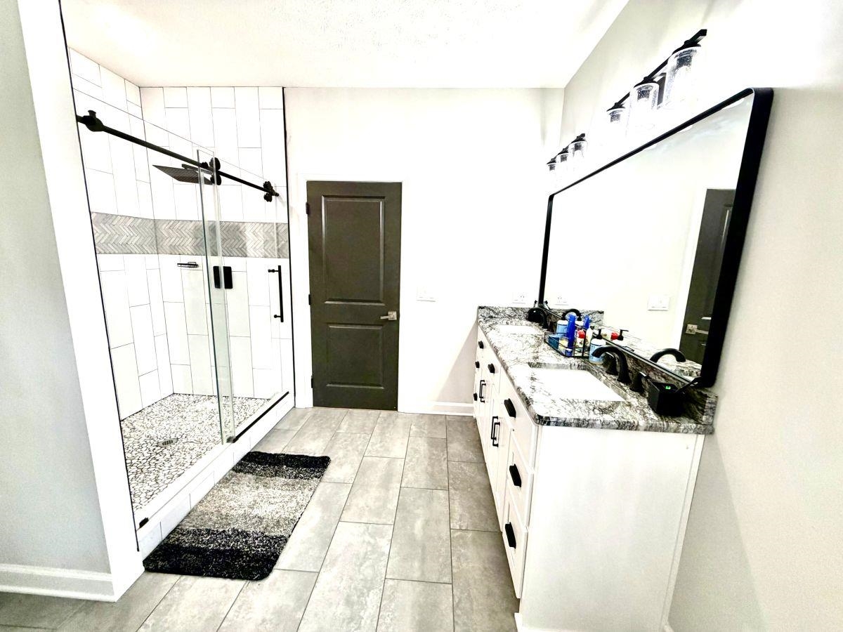 725 Crow Lane Counce, TN 38326 - Photo 6 of 19 a kitchen with a sink a refrigerator and a stove