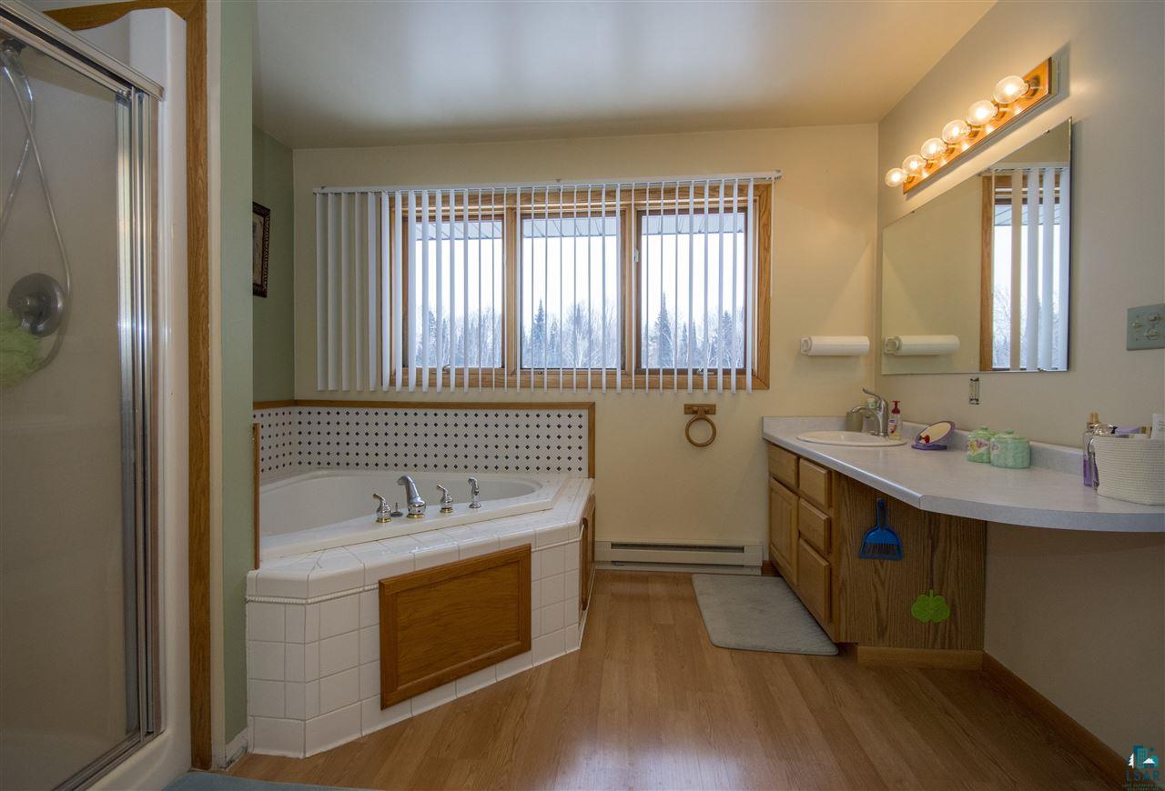 5548 McQuade Road Duluth, MN 55804 - Photo 5 of 24 Master Bath with jetted garden tub