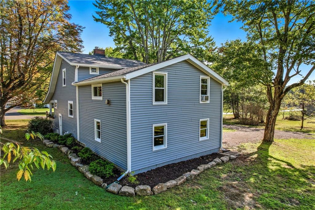 1039 North Keel Ridge Road Hermitage, PA 16148 - Photo 3 of 47 a view of a house with a yard