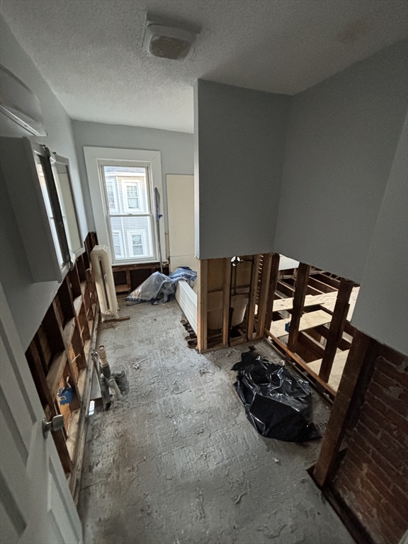 90 Cambridge Street Springfield, MA 01109 - Photo 16 of 25 a view of livingroom with furniture and a flat screen tv