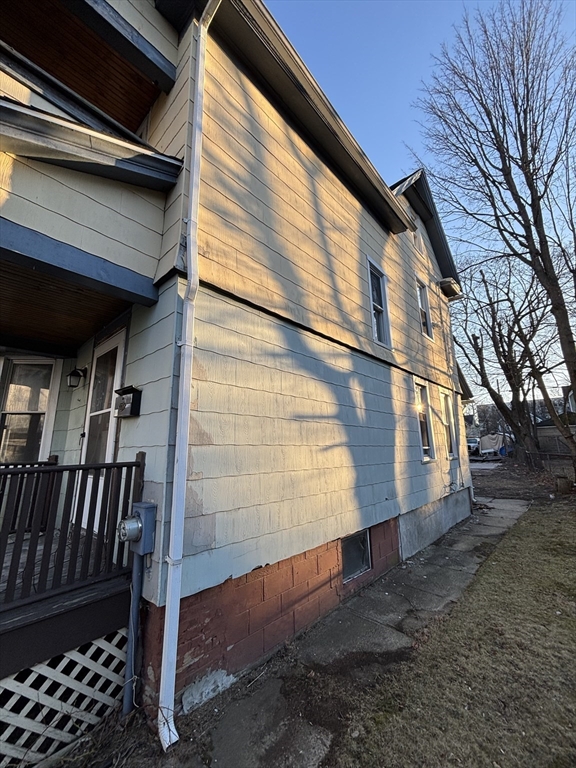 90 Cambridge Street Springfield, MA 01109 - Photo 3 of 25 a view of a house with a yard