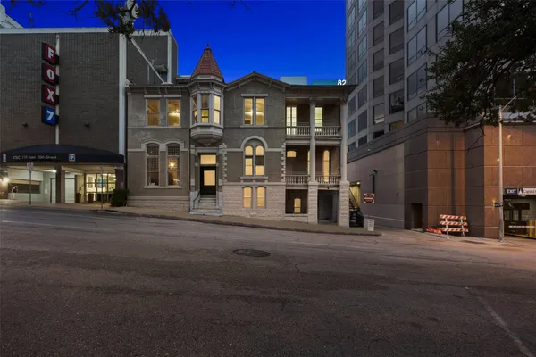 a front view of a building with street view