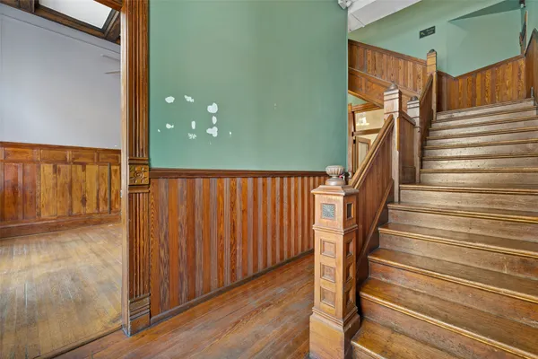 a view of entryway with wooden floor
