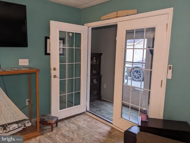 a kitchen with a refrigerator stove and microwave