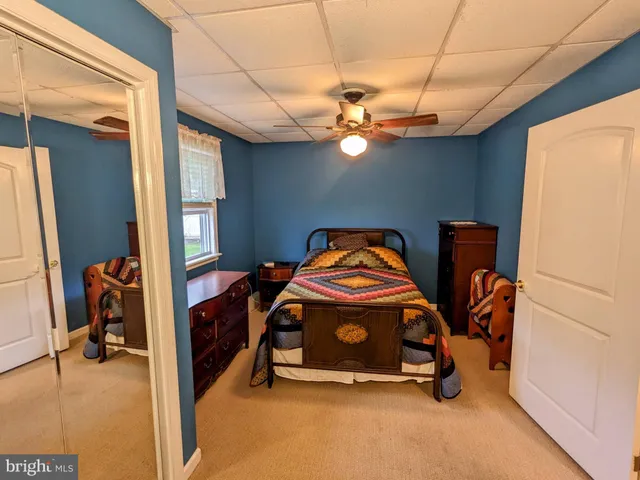 a kitchen with stainless steel appliances a stove a sink and a refrigerator