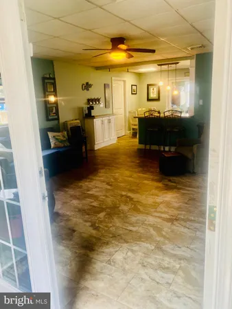 an aerial view of a house with yard swimming pool and outdoor seating