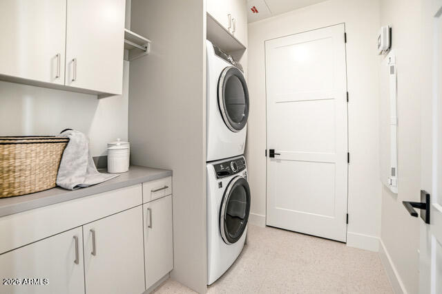 4849 North Camelback Ridge Road, Unit A107 Scottsdale, AZ 85251 - Photo 3 of 7 a utility room with dryer and washer