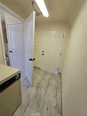 a view of a bathroom with a sink and a shower