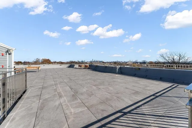 a terrace with a city view