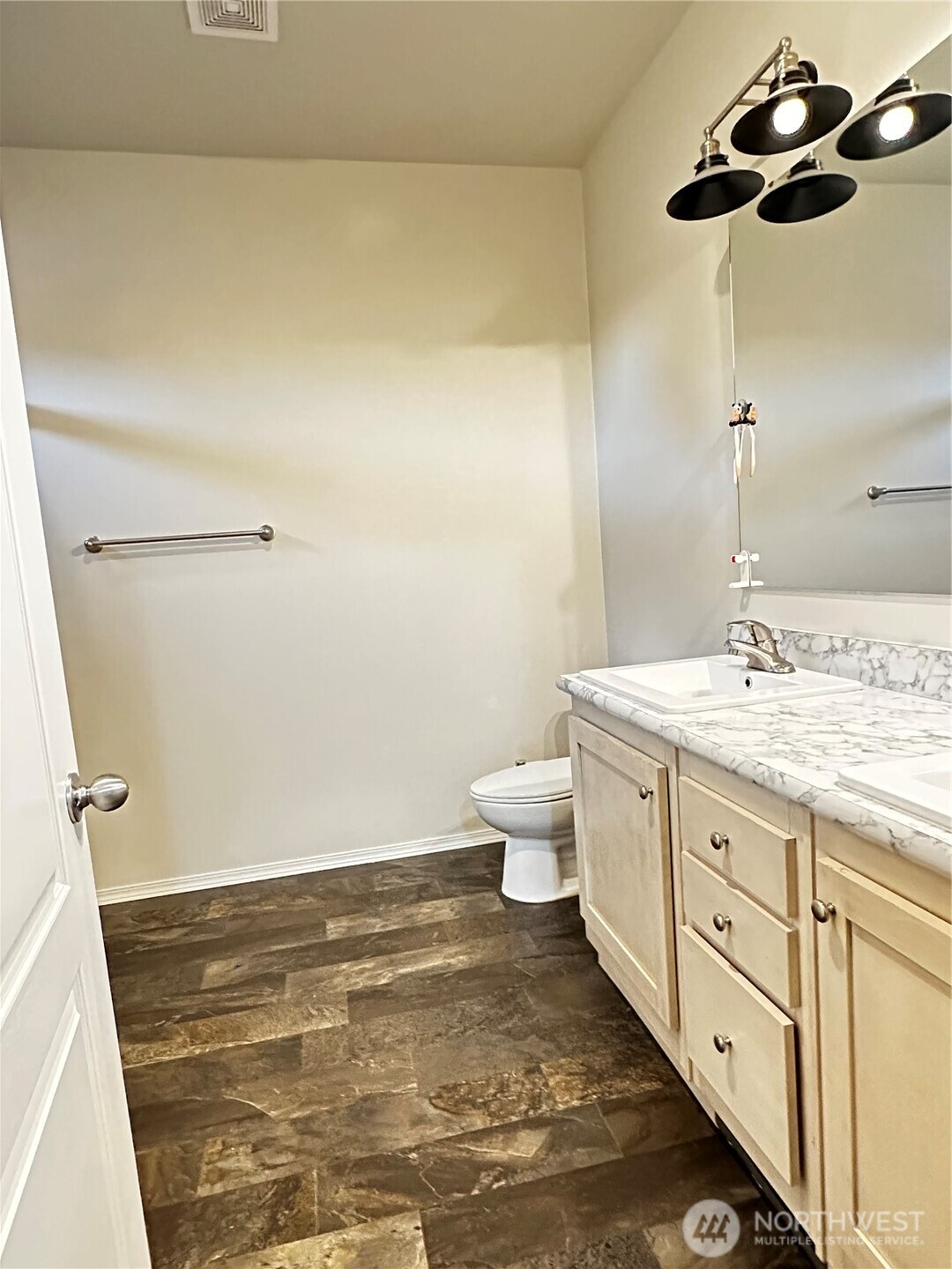 1720 Maple Lane, Unit 33 Kent, WA 98030 - Photo 12 of 20 a bathroom with a granite countertop sink and a mirror