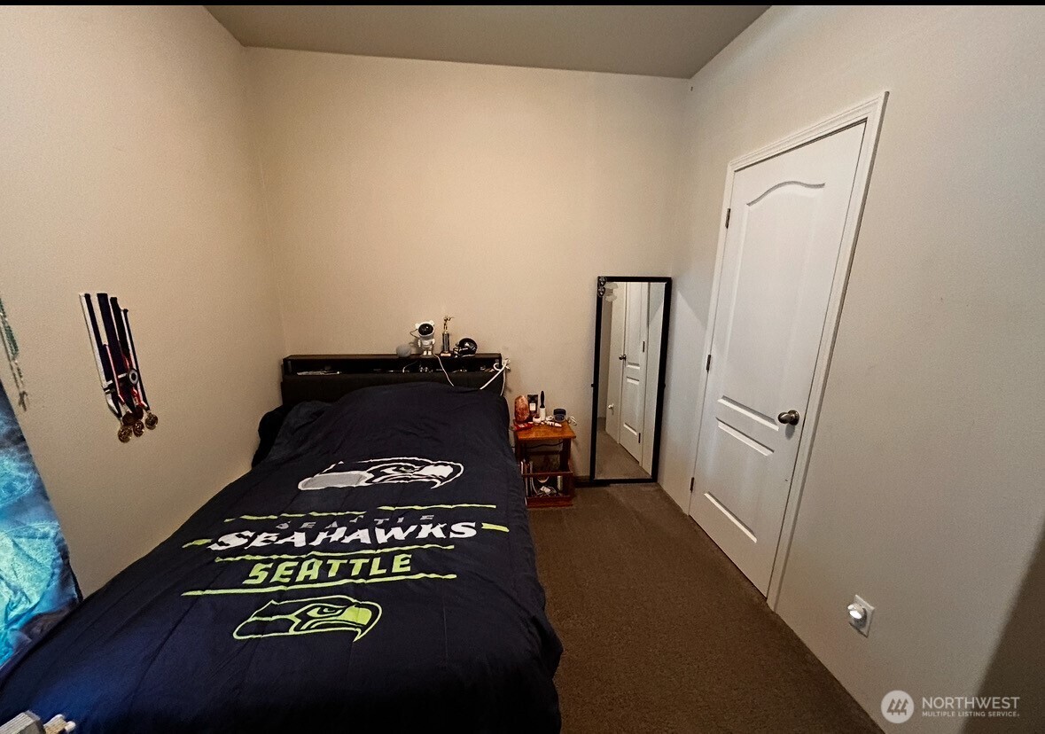 1720 Maple Lane, Unit 33 Kent, WA 98030 - Photo 14 of 20 a close view of shoes stand and cabinets
