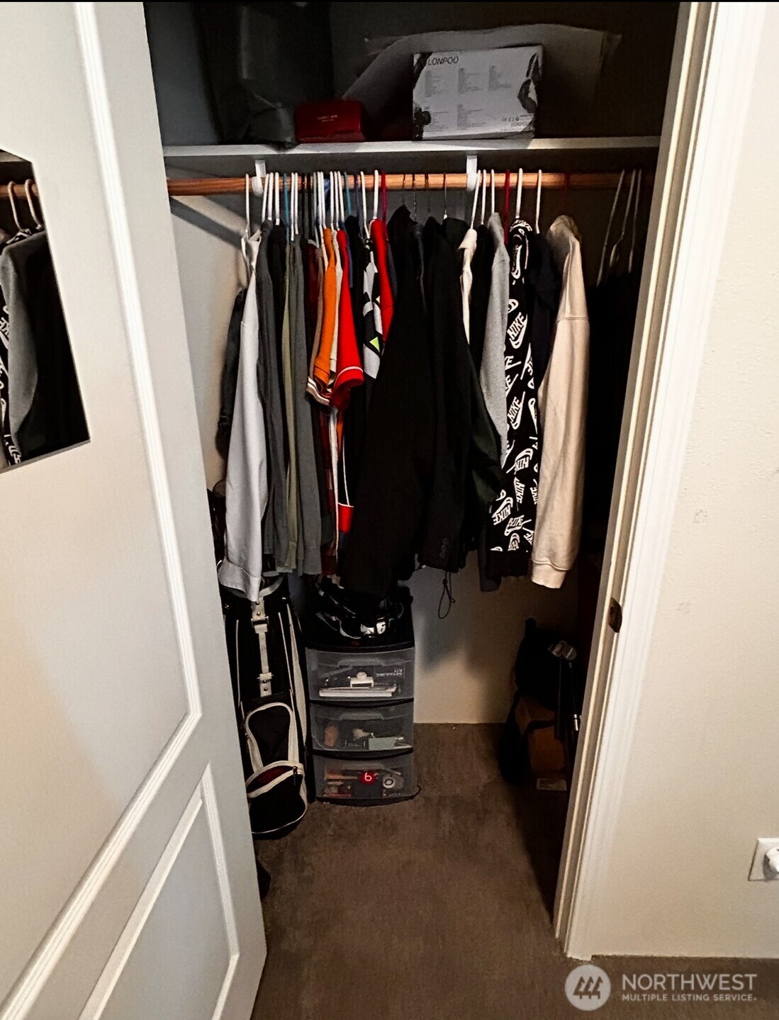 1720 Maple Lane, Unit 33 Kent, WA 98030 - Photo 15 of 20 a view of walk in closet with clothes