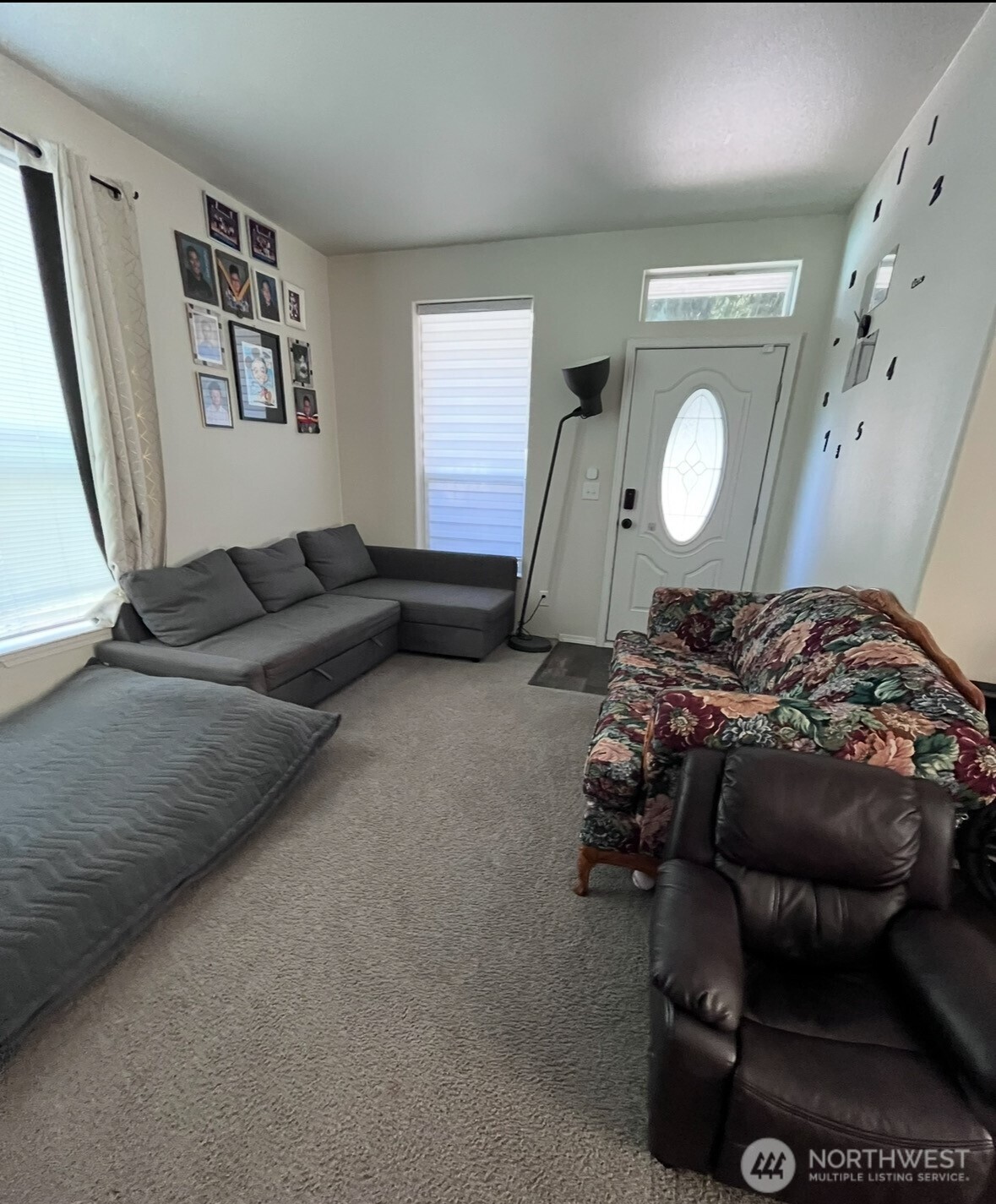 1720 Maple Lane, Unit 33 Kent, WA 98030 - Photo 3 of 20 a bedroom with a bed and wooden floor