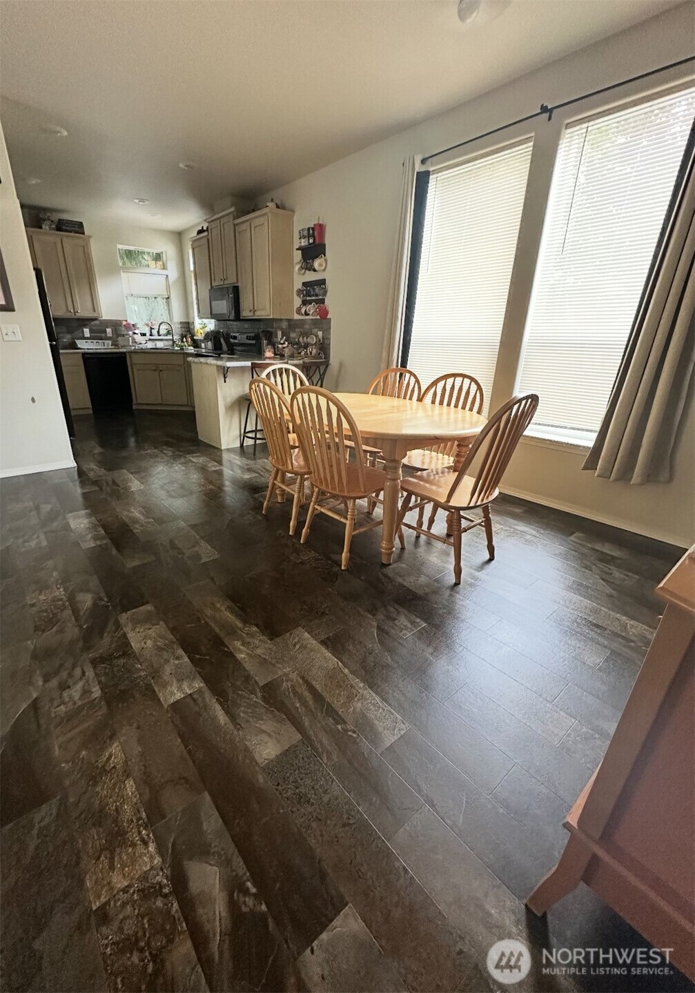 1720 Maple Lane, Unit 33 Kent, WA 98030 - Photo 5 of 20 a dining room with furniture and a large window
